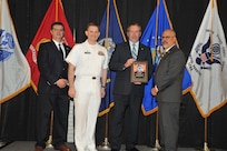 IMAGE: Robert Turner is presented the Award of Excellence for Systems Engineering and Integration at Naval Surface Warfare Center Dahlgren Division's annual awards ceremony, Apr. 26 at the Fredericksburg Expo and Conference Center.

The Award of Excellence for Systems Engineering and Integration was established to recognize individuals who have made a notable and significant impact to NSWCDD through their outstanding performance in systems engineering and integration.