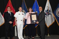 IMAGE: Joyce Clark is presented the Paul J. Martini Award at Naval Surface Warfare Center Dahlgren Division's annual awards ceremony, Apr. 26 at the Fredericksburg Expo and Conference Center.

The award is named in honor of Paul J. Martini, who was head of the Engineering Support Directorate of the Naval Ordnance Laboratory from November 1951 to December 1973.