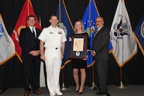 IMAGE: Crystal Breen is presented the Paul J. Martini Award at Naval Surface Warfare Center Dahlgren Division's annual awards ceremony, Apr. 26 at the Fredericksburg Expo and Conference Center.

The award is named in honor of Paul J. Martini, who was head of the Engineering Support Directorate of the Naval Ordnance Laboratory from November 1951 to December 1973.