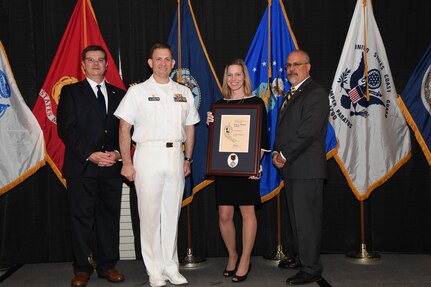 IMAGE: Crystal Breen is presented the Paul J. Martini Award at Naval Surface Warfare Center Dahlgren Division's annual awards ceremony, Apr. 26 at the Fredericksburg Expo and Conference Center.

The award is named in honor of Paul J. Martini, who was head of the Engineering Support Directorate of the Naval Ordnance Laboratory from November 1951 to December 1973.