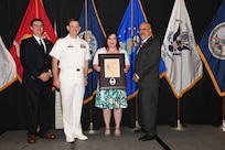 IMAGE: Tanja Hines is presented the Paul J. Martini Award at Naval Surface Warfare Center Dahlgren Division's annual awards ceremony, Apr. 26 at the Fredericksburg Expo and Conference Center.

The award is named in honor of Paul J. Martini, who was head of the Engineering Support Directorate of the Naval Ordnance Laboratory from November 1951 to December 1973.