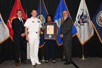 IMAGE: Audra Lucas-Peyton is presented the Paul J. Martini Award at Naval Surface Warfare Center Dahlgren Division's annual awards ceremony, Apr. 26 at the Fredericksburg Expo and Conference Center.

The award is named in honor of Paul J. Martini, who was head of the Engineering Support Directorate of the Naval Ordnance Laboratory from November 1951 to December 1973.