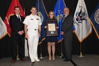 IMAGE: Vikki Rouleau is presented the Paul J. Martini Award at Naval Surface Warfare Center Dahlgren Division's annual awards ceremony, Apr. 26 at the Fredericksburg Expo and Conference Center.

The award is named in honor of Paul J. Martini, who was head of the Engineering Support Directorate of the Naval Ordnance Laboratory from November 1951 to December 1973.