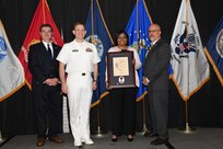 IMAGE: Shantae Collins is presented the Paul J. Martini Award at Naval Surface Warfare Center Dahlgren Division's annual awards ceremony, Apr. 26 at the Fredericksburg Expo and Conference Center.

The award is named in honor of Paul J. Martini, who was head of the Engineering Support Directorate of the Naval Ordnance Laboratory from November 1951 to December 1973.
