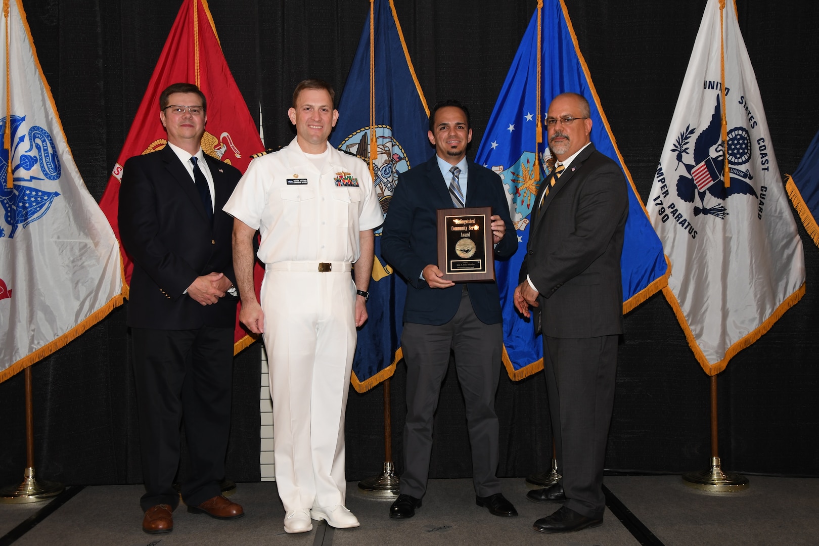IMAGE: Jose Polo-Morales is presented the Distinguished Community Service Award at Naval Surface Warfare Center Dahlgren Division's annual awards ceremony, Apr. 26 at the Fredericksburg Expo and Conference Center.