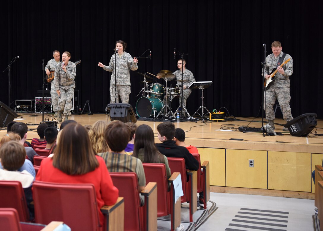 The U.S. Air Force Band of the Pacific Trends perform at Osan Middle High School, Osan Air Base, Republic of Korea, May 7, 2018. The purpose of the concert was to provide the students with some end of day entertainment and potentially inspire someone into taking up an instrument or use music as an outlet. (U.S. Air Force photo by Airman 1st Class Ilyana A. Escalona)