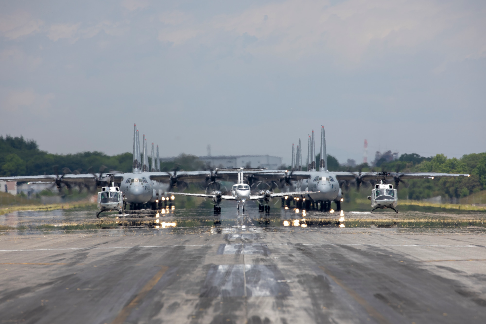 Aircraft from the 374th Airlift Wing (AW) conduct the 374th AW Generation Exercise Elephant Walk