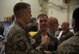 U.S. Air Force Master Sgt. Christopher Browne, left, the 35th Maintenance Squadron jet engine intermediate maintenance section chief, and USAF Brig. Gen. Jeffrey C. Bozard, right, the 5th Air Force vice commander, discuss operations at Misawa Air Base, Japan, May 1, 2018. Bozard noticed and reassured Team Misawa members’ commitment and devotion to the mission’s value. (U.S. Air Force photo by Airman 1st Class Collette Brooks)