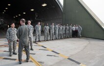 U.S. Air Force Brig. Gen. Jeffrey C. Bozard, the 5th Air Force vice commander, discusses base operations during his tour with USAF 1st Lt. Jessica Dacpano, the 13th Aircraft Maintenance Unit assistant officer in charge, in front of a hardened aircraft shelter at Misawa Air Base, Japan, May 2, 2018. Meeting with Bozard gave Airmen a chance to showcase their career field and how it contributes to Misawa AB’s mission. (U.S. Air Force photo by Airman 1st Class Collette Brooks)