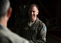 U.S. Air Force Brig. Gen. Jeffrey C. Bozard, the 5th Air Force vice commander, speaks with an Airman during his tour of Misawa Air Base, Japan, May 2, 2018. When meeting with Airmen, Bozard questioned where they were from and what they thought of Misawa to get to know them personally. (U.S. Air Force photo by Airman 1st Class Collette Brooks)
