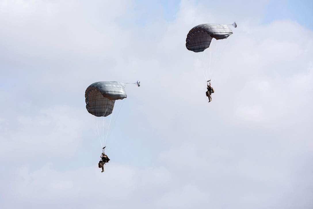 Airmen participate in a high altitude, low-opening free-fall jump.