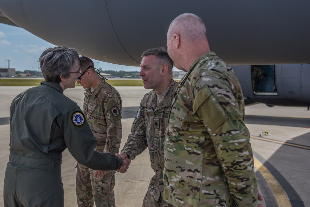 Secretary of the Air Force Heather Wilson is greeted by Lt. Col. Brian Jones, 193rd Special Operations Squadron director of operations, Pennsylvania Air National Guard.