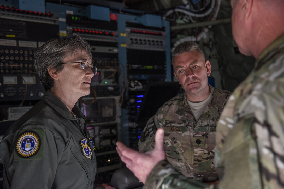 Secretary of the Air Force Heather Wilson listens in on a brief from Chief Master Sgt. William Lengner.