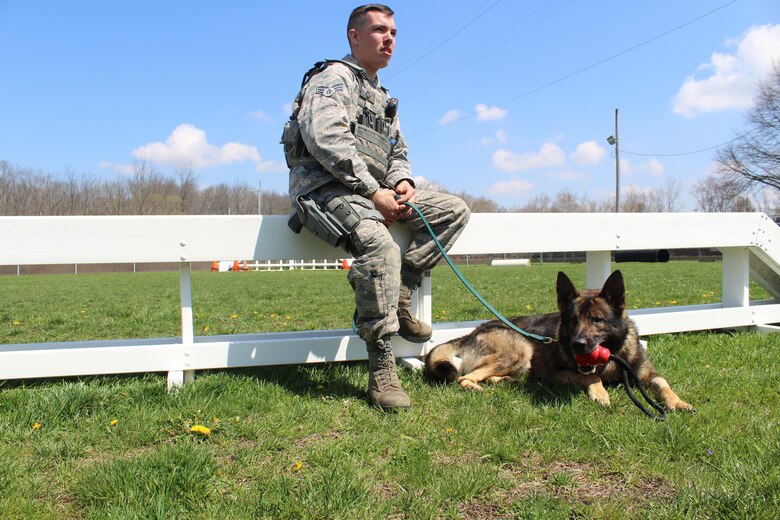 Image result for SECURITY DOGS AND THEIR HANDLERS