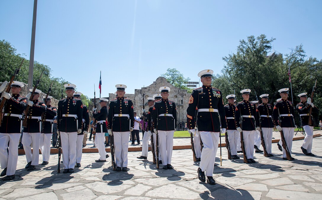 Gunnery Sgt. Michael Charneske, platoon sergeant, U.S. Marine Corps Silent Drill Platoon, marches in front of the formation during SDP’s performance as a part of a Battle Color Ceremony for the San Antonio Tricentennial Military Appreciation Day at the Alamo, San Antonio, Texas, May 6, 2018. The Military Appreciation Day was held in San Antonio to salute military history with a weekend of programming including special events, ceremonies and living history demonstrations. (Official U.S. Marine Corps photo by Sgt. Robert Knapp/Released)