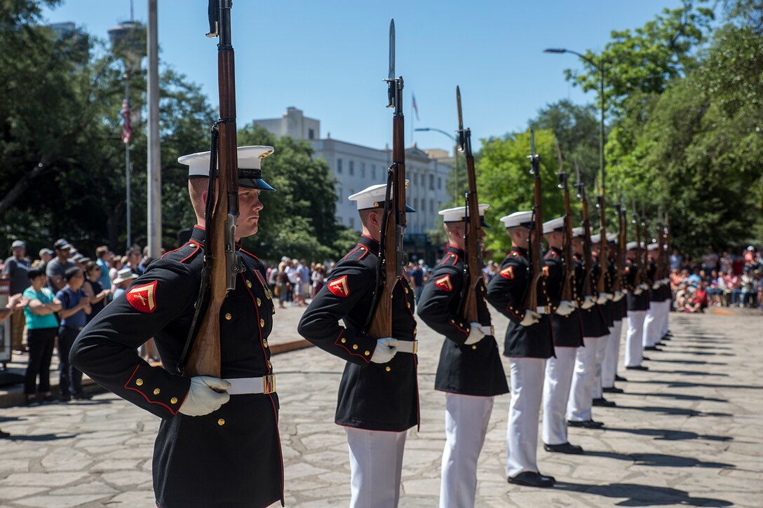 Marines with the U.S. Marine Corps Silent Drill Platoon execute their “long line” sequence during their performance as a part of a Battle Color Ceremony for the San Antonio Tricentennial Military Appreciation Day at the Alamo, San Antonio, Texas, May 6, 2018. The Military Appreciation Day was held in San Antonio to salute military history with a weekend of programming including special events, ceremonies and living history demonstrations. (Official U.S. Marine Corps photo by Sgt. Robert Knapp/Released)