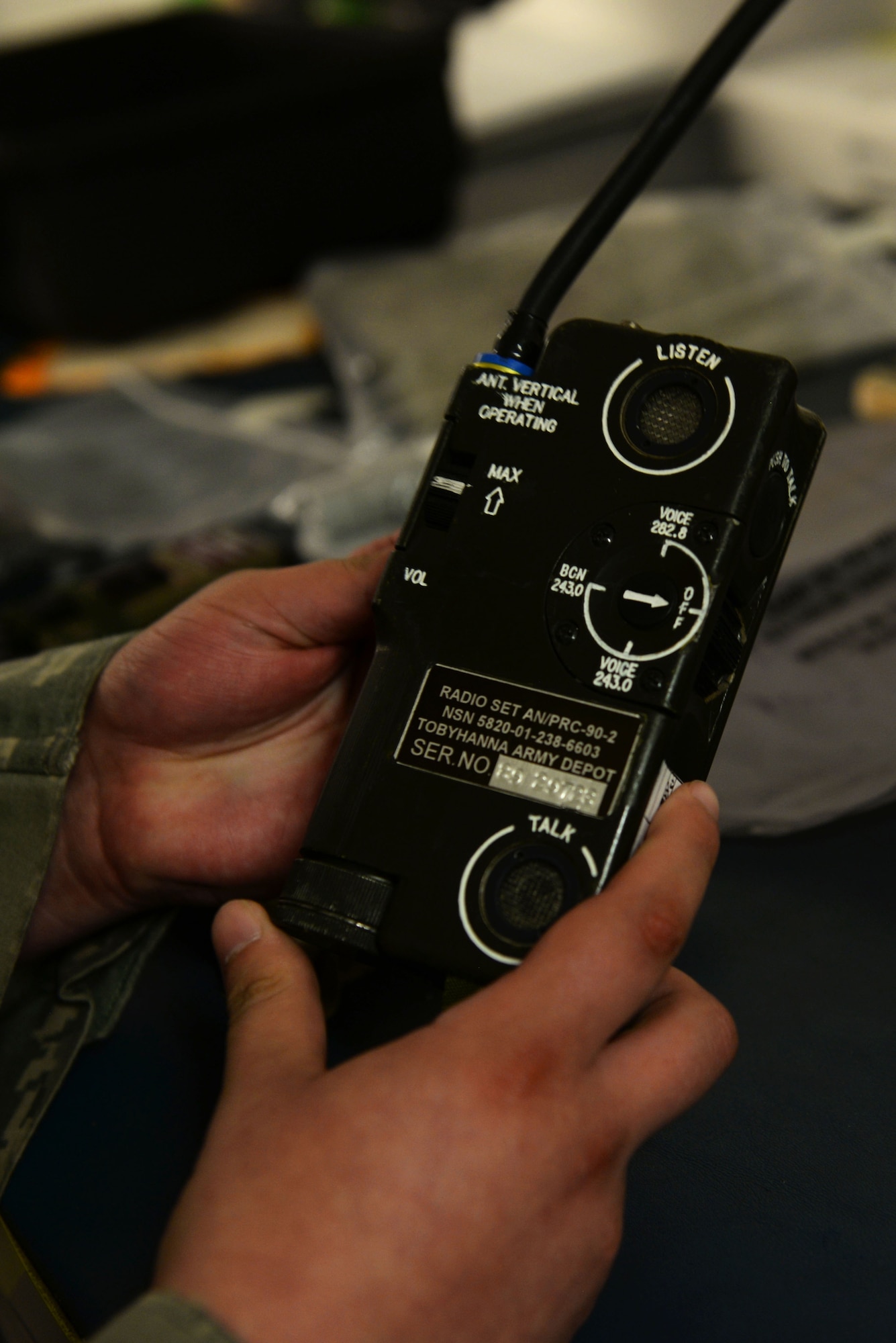 A U.S. Airman from the 100th Operations Support Squadron aircrew flight equipment shop inspects a radio to ensure it’s ready to use at RAF Mildenhall, England, April 24, 2018. The technicians routinely check the quality of all the equipment they are responsible for. (U.S. Air Force photo by Airman 1st Class Alexandria Lee)