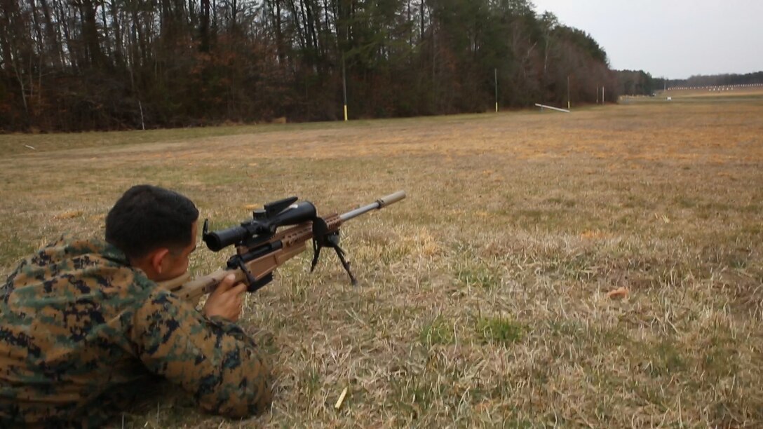 Sgt. Randy Robles, Quantico Scout Sniper School instructor and Marine Corps Systems Command liaison, demonstrates the Mk13 Mod 7 Sniper Rifle during training aboard Marine Corps Base Quantico, Virginia. MCSC will field the Mk13 in late 2018 and throughout 2019 to increase the lethality and combat effectiveness of scout snipers on the battlefield.