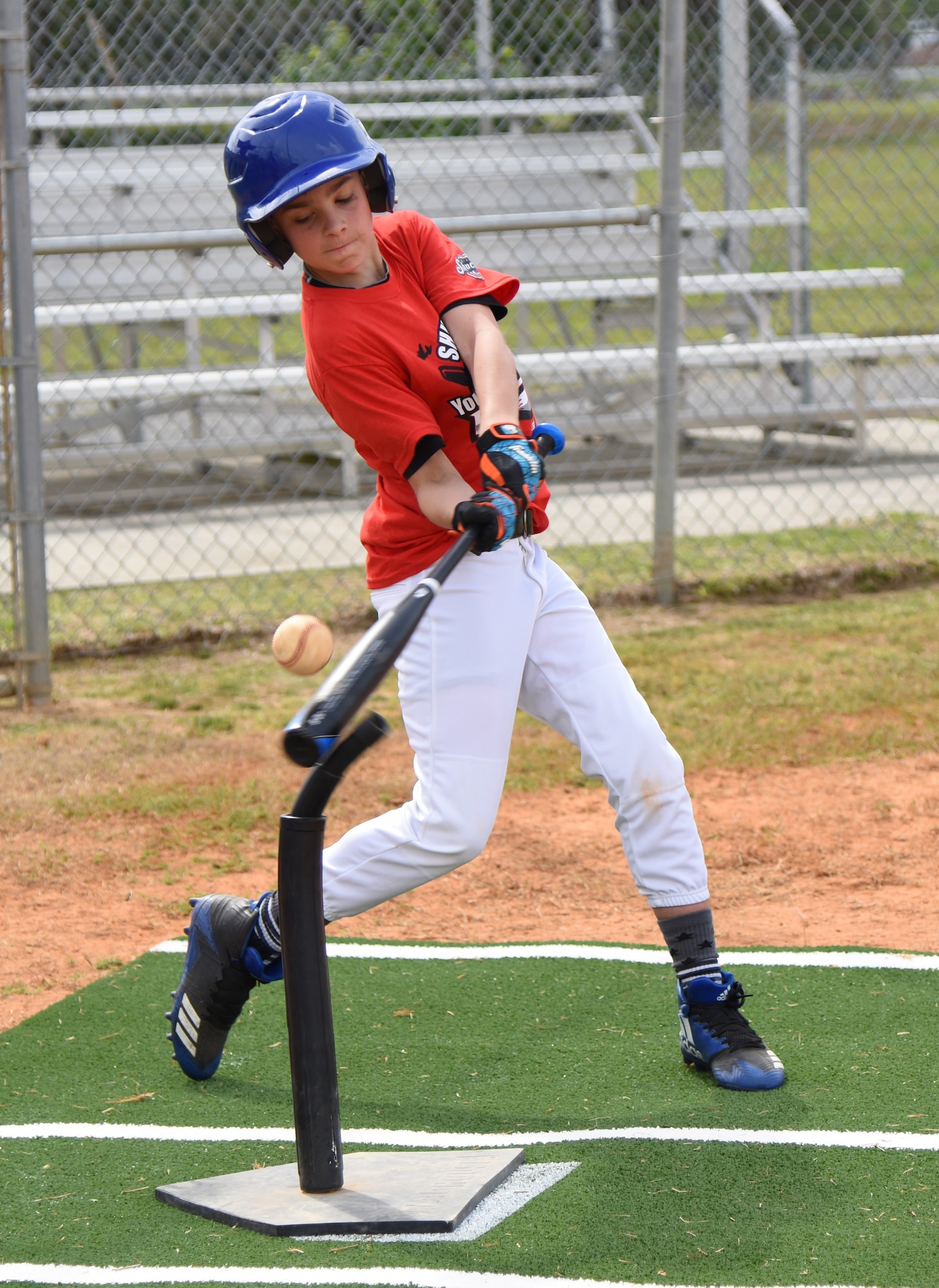Maddox Cloutier, son of U.S. Air Force Master Sgt. Brian Cloutier, 558th Flying Training Squadron remotely piloted aircraft pilot training student, Joint Base San Antonio-Randolph Air Force Base, Texas, takes a swing during the Biloxi Shuckers Youth Baseball Clinic on the youth center baseball field at Keesler Air Force Base, Mississippi, May 5, 2018. The clinic provided hitting, pitching, base running and fielding instruction from members of the Biloxi Shuckers minor league baseball team. (U.S. Air Force photo by Kemberly Groue)