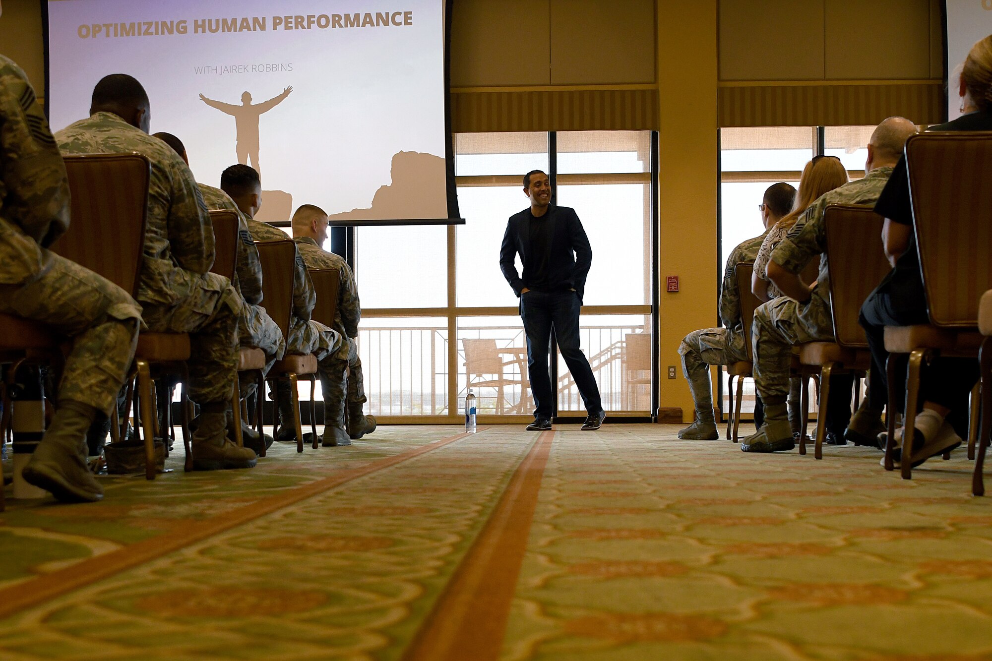 Jairek Robbins, performance coach, speaks to Keesler personnel during a private mentoring session in the Bay Breeze Event Center at Keesler Air Force Base, Mississippi, May 7, 2018. Approximately 100 Keesler members signed up for “The Complete Guide to Activating High Performance” course, a 4-week online training course with weekly guided face-to-face discussions as well as a private mentoring session with Robbins. (U.S. Air Force photo by Airman 1st Class Suzie Plotnikov)