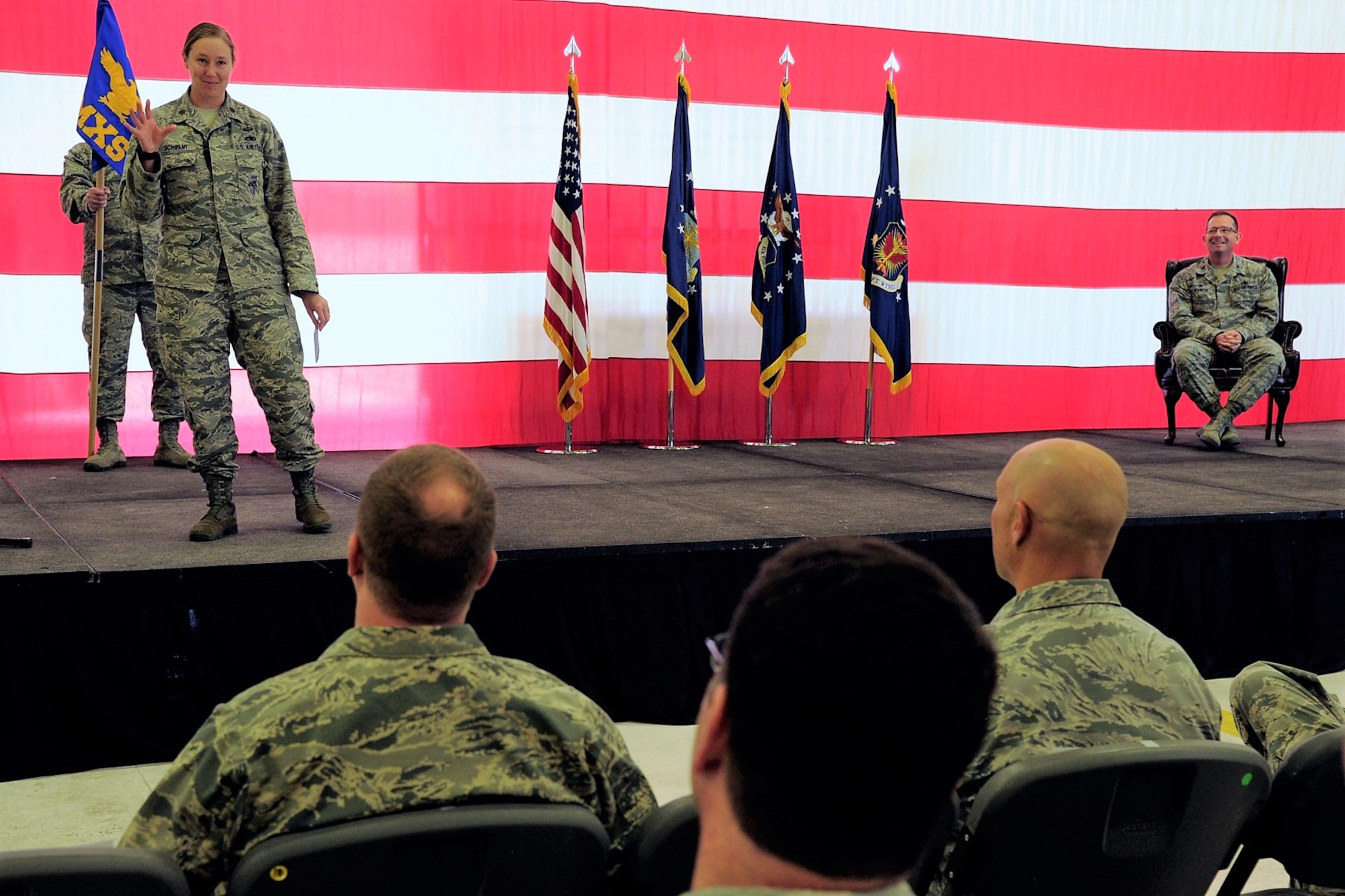 Maj. Katherine Schifani, the 302nd Maintenance Squadron commander, addresses her squadron for the first time as their commander during her assumption of command ceremony at Peterson Air Force Base, Colorado, May 5, 2018.