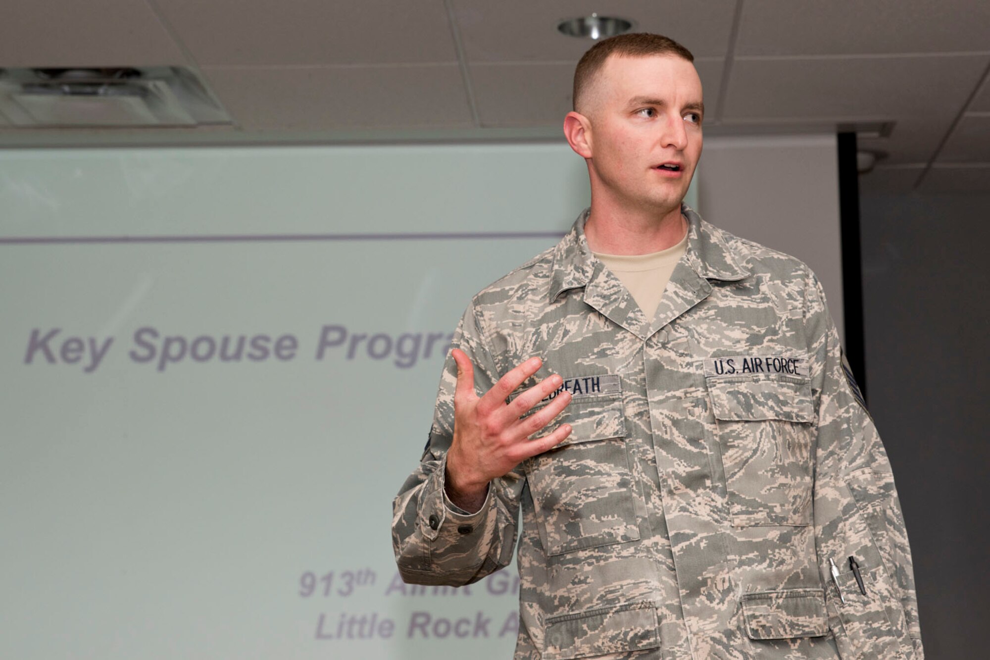 U.S. Air Force Reserve Master Sgt. Matthew Kilbreath, non-commissioned officer in charge, Airman and Family Readiness, 913th Airlift Group, speaks about the Key Spouse Program during an All Call, May 5, 2018, at Little Rock Air Force Base, Ark.
