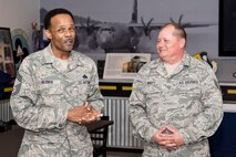 U.S. Air Force Reserve Chief Master Sgt. Alvin Glover, superintendent of operations, 96th Aerial Port Squadron, speaks to a group of family, friends and co-workers during the retirement ceremony for Tech Sgt. David Mavity at Little Rock Air Force Base, Ark., May 5, 2018.