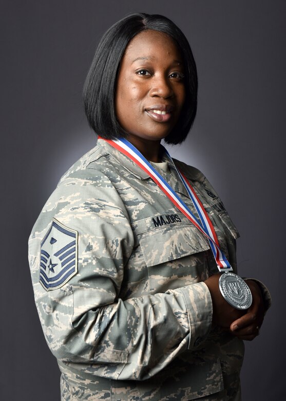 U.S. Air Force Master Sgt. Simorrah Majors, 363rd Intelligence, Surveillance Reconnaissance wing first sergeant, poses for a portrait at Joint Base Langley-Eustis, Virginia, May 9, 2018.