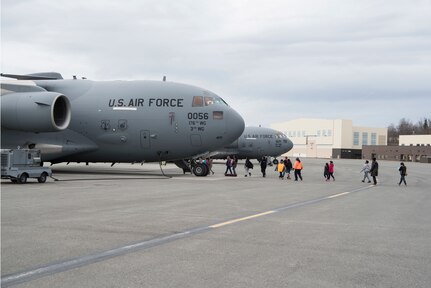 Personnel with the 673d Air Base Wing and 3rd Wing hosted a “Day in the Life of Airmen” tour for 5th-grade students from Wonder Park and Mountain View elementary schools at Joint Base Elmendorf-Richardson, Alaska, May 4, 2018. The goal of the tour was to provide background knowledge about the work and to entice questions, while giving the students a beyond-the-scenes experience.