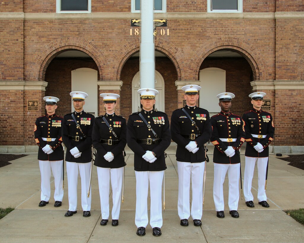 Marines with the Marine Barracks Washington D.C. Parade Marching Staff pose for a photo at the Barracks, May 1, 2018. (Official U.S. Marine Corps photo by Cpl. Damon Mclean/Released)