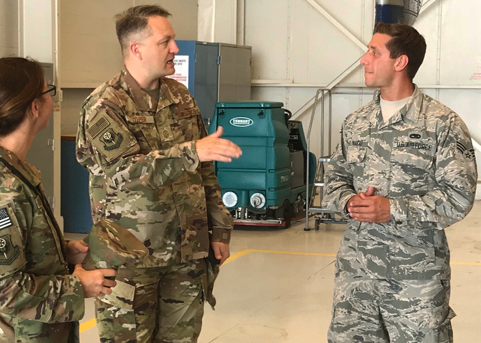 Chief Master Sgt. James Loper, 10th Air Force Command Chief, meets Senior Airman Kerstan Chojnacki, 919th Special Operations Aircraft Maintenance Squadron