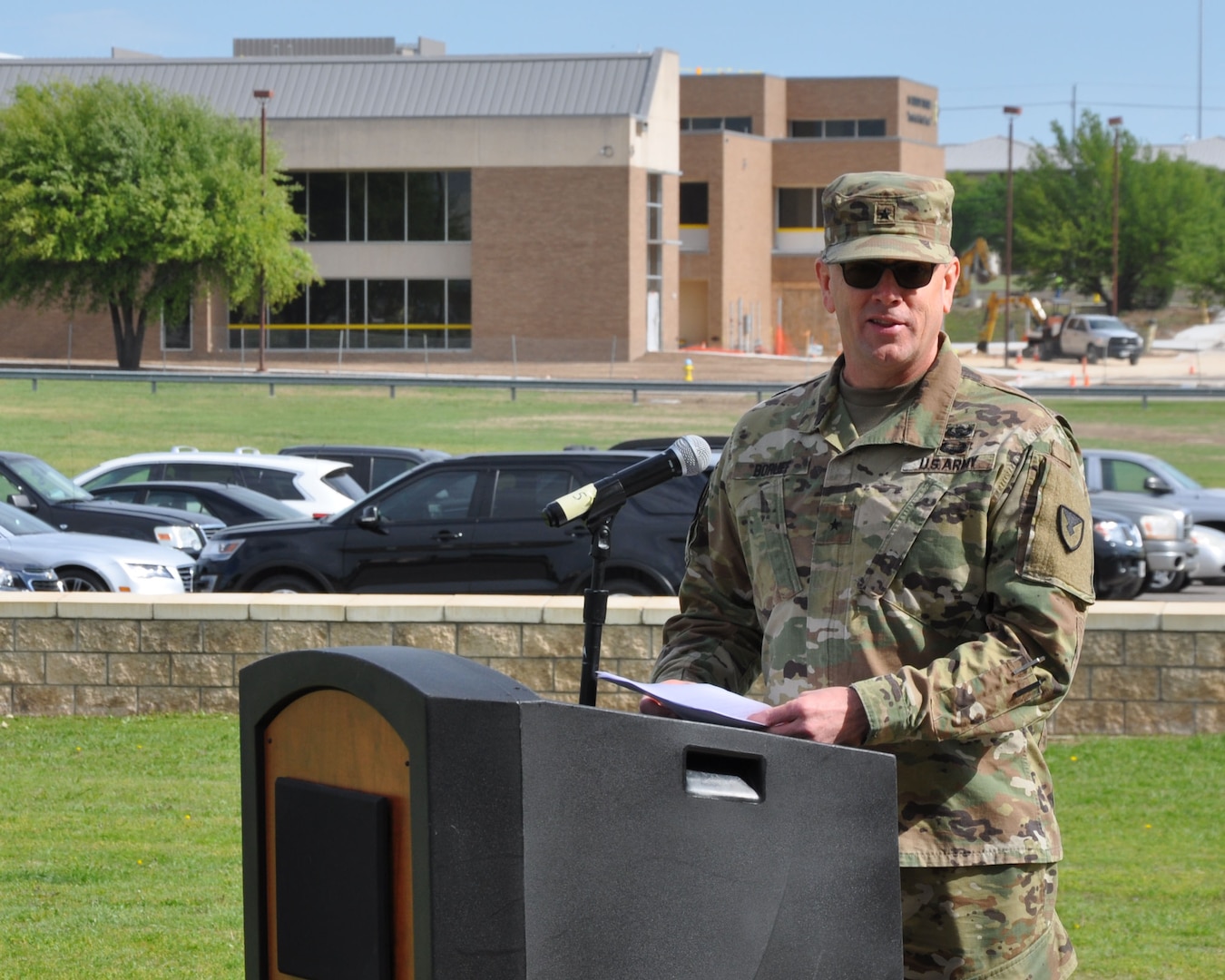 Brig. Gen. Bill Boruff addresses members of the 418th Contracting Support Brigade, military leaders, families and friends during while presiding over an uncasing ceremony April 20 at Fort Hood, Texas. The uncasing of 418th CSB organizational colors signals the return from deployment to Afghanistan for the unit. Boruff is the commanding general of the Mission and Installation Contracting Command at Joint Base San Antonio-Fort Sam Houston.