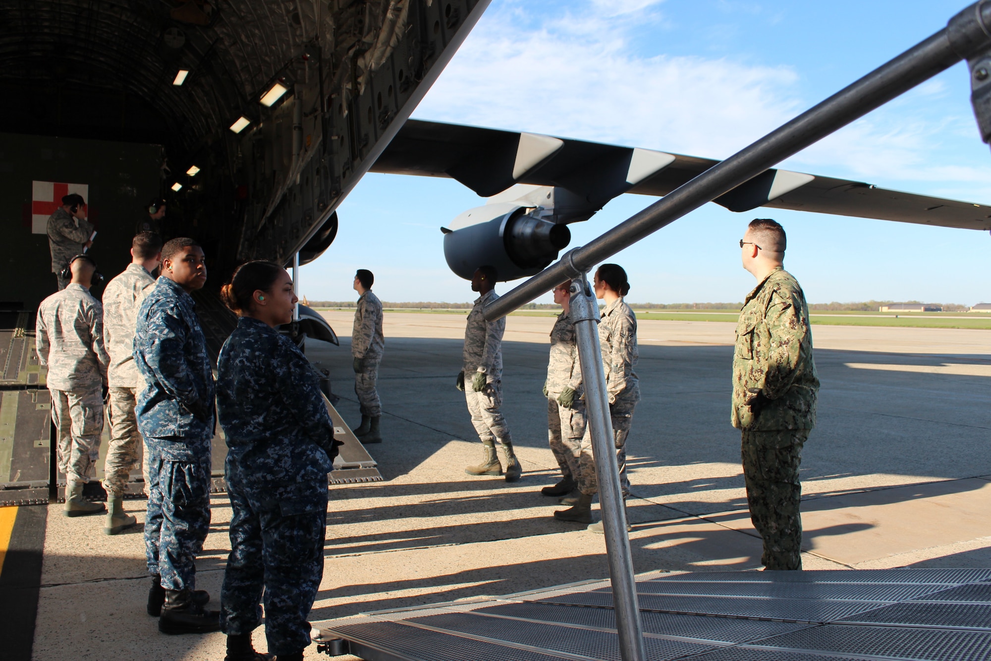 Service members unload patients during an aeromedical evacuation from Ramstein Air Base, Germany, to Joint Base Andrews, Md., April 26, 2018. Missions transport sick or injured patients to the U.S. from around the world. (U.S. Air Force photo by Karina Luis)