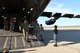 Service members unload patients during an aeromedical evacuation from Ramstein Air Base, Germany, to Joint Base Andrews, Md., April 26, 2018. Missions transport sick or injured patients to the U.S. from around the world. (U.S. Air Force photo by Karina Luis)