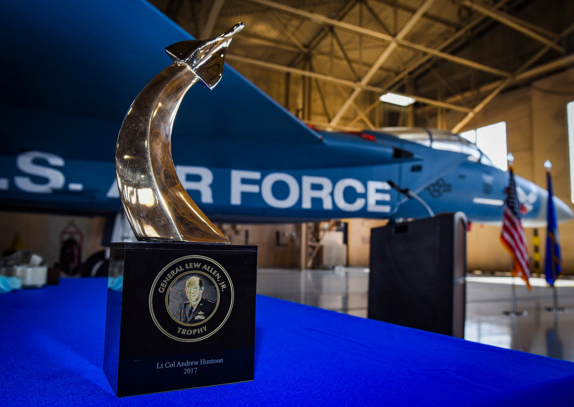 The Gen. Lew Allen Award sits in front of an F-15 Eagle fighter jet during a ceremony at Nellis Air Force Base, Nevada, May 2, 2018. The award recognizes the outstanding performances of Air Force personnel involved in aircraft sortie generation and mission execution. (U.S. Air Force photo by Airman 1st Class Andrew D. Sarver)