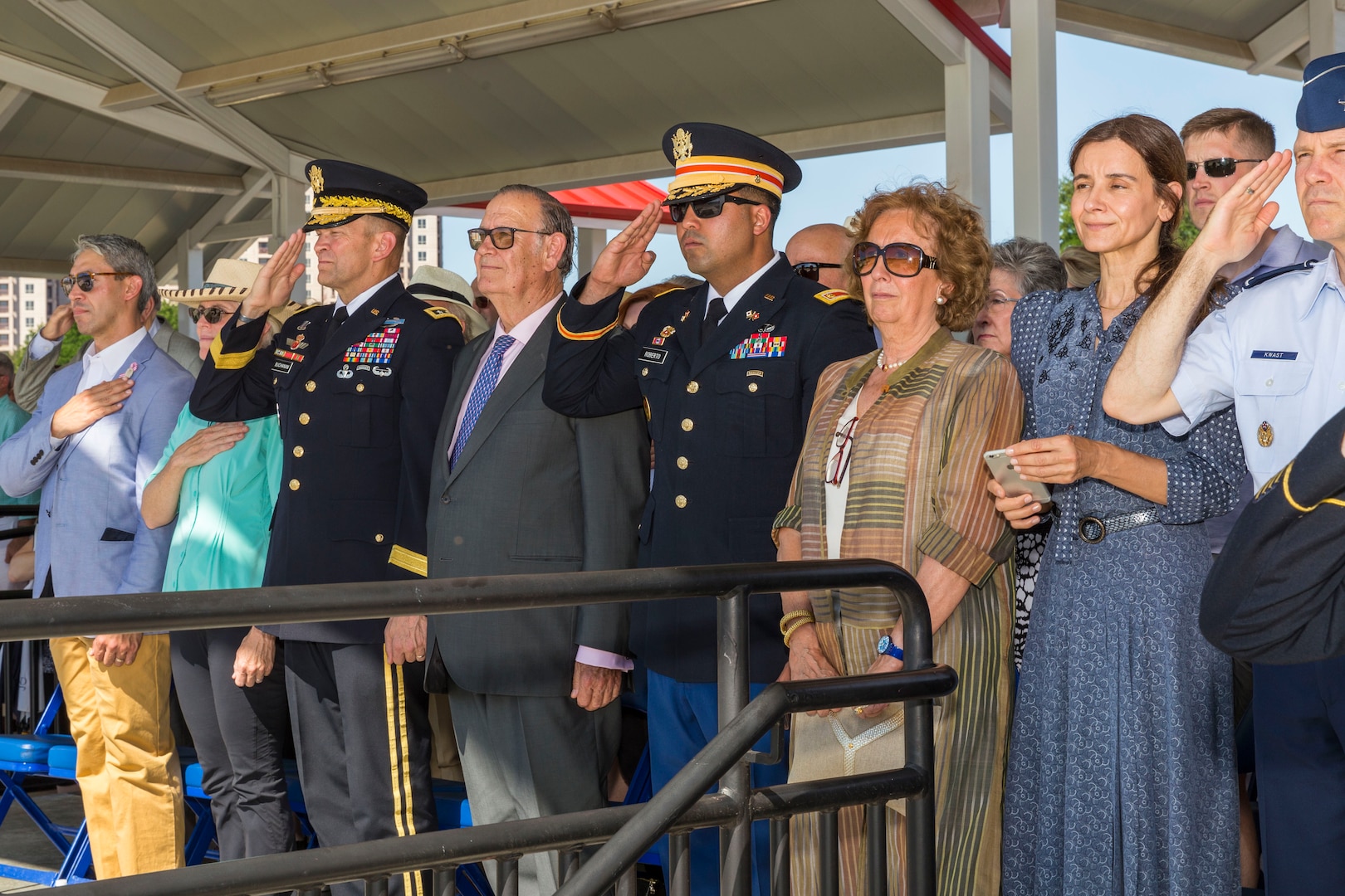 Joint Base San Antonio and community members render honors as the national anthem plays during the annual Military Appreciation Weekend May 6, 2017 at Joint Base San Antonio-Fort Sam Houston, Texas. U.S. Army North and JBSA hosted the two-day event, which featured music, family activities, and various military demonstrations. This year, the appreciation weekend also commemorated the 300th anniversary for the city of San Antonio. (U.S. Air Force photo by Ismael Ortega / Released)