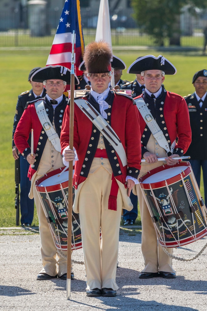 U.S. Army Old Guard Fife and Drum Corps perform during the annual Military Appreciation Weekend May 6, 2017 at Joint Base San Antonio-Fort Sam Houston, Texas. U.S. Army North and JBSA hosted the two-day event, which featured music, family activities, and various military demonstrations. This year, the appreciation weekend also commemorated the 300th anniversary for the city of San Antonio. (U.S. Air Force photo by Ismael Ortega / Released)