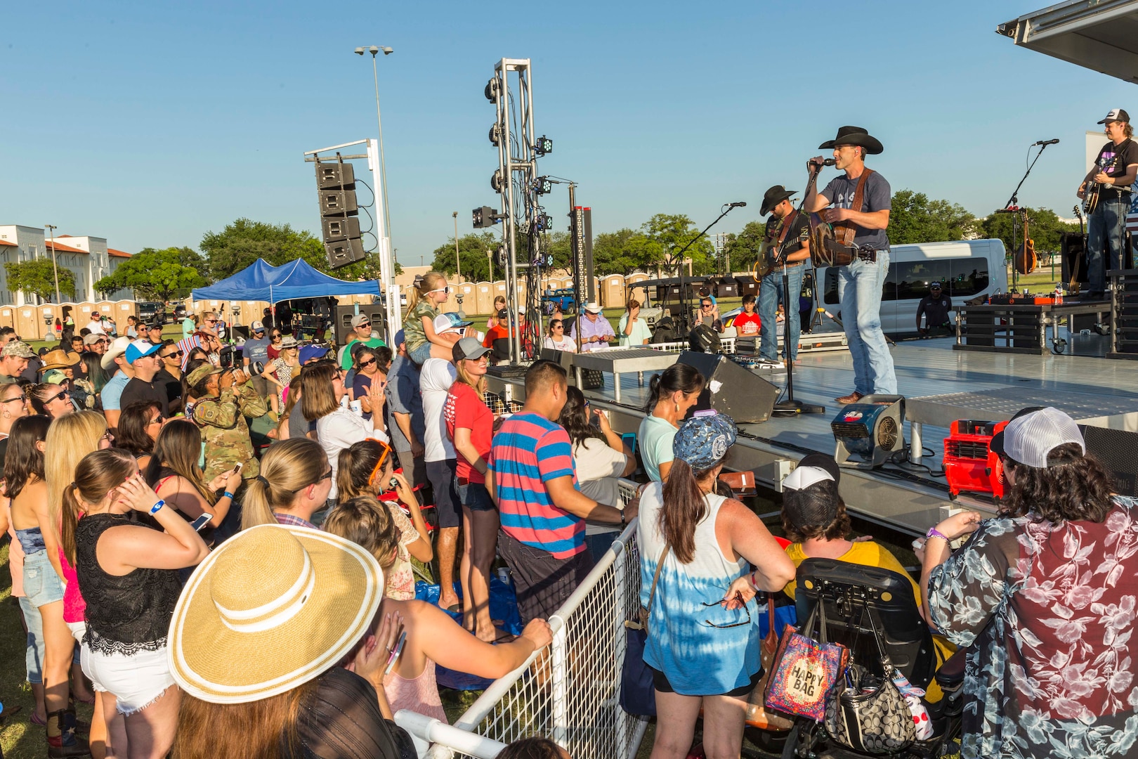 Team Joint Base San Antonio and community members attend an Aaron Watson concert during the annual Military Appreciation Weekend May 6, 2017 at Joint Base San Antonio-Fort Sam Houston, Texas. U.S. Army North and JBSA hosted the two-day event, which featured music, family activities, and various military demonstrations. This year, the appreciation weekend also commemorated the 300th anniversary for the city of San Antonio. (U.S. Air Force photo by Ismael Ortega / Released)