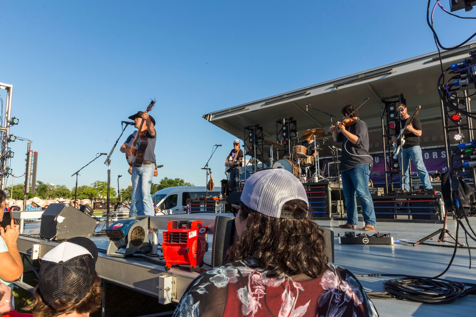 Team Joint Base San Antonio and community members attend an Aaron Watson concert during the annual Military Appreciation Weekend May 6, 2017 at Joint Base San Antonio-Fort Sam Houston, Texas. U.S. Army North and JBSA hosted the two-day event, which featured music, family activities, and various military demonstrations. This year, the appreciation weekend also commemorated the 300th anniversary for the city of San Antonio. (U.S. Air Force photo by Ismael Ortega / Released)