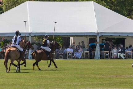 U.S. Army and Navy polo teams compete against one another during the annual Military Appreciation Weekend May 6, 2017 at Joint Base San Antonio-Fort Sam Houston, Texas. U.S. Army North and JBSA hosted the two-day event, which featured music, family activities, and various military demonstrations. This year, the appreciation weekend also commemorated the 300th anniversary for the city of San Antonio. (U.S. Air Force photo by Ismael Ortega / Released)