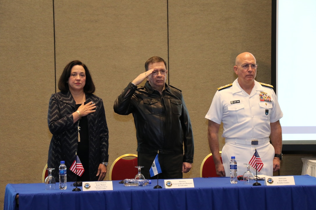 Military leaders render honors.