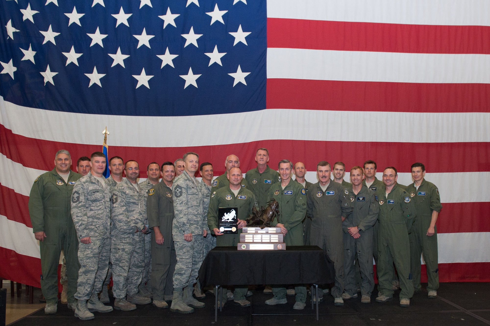 Maj. Gen. Ronald B. Miller, 10th Air Force Commander, poses with members of the 920th Rescue Wing after presenting them with the Power and Vigilance award.
