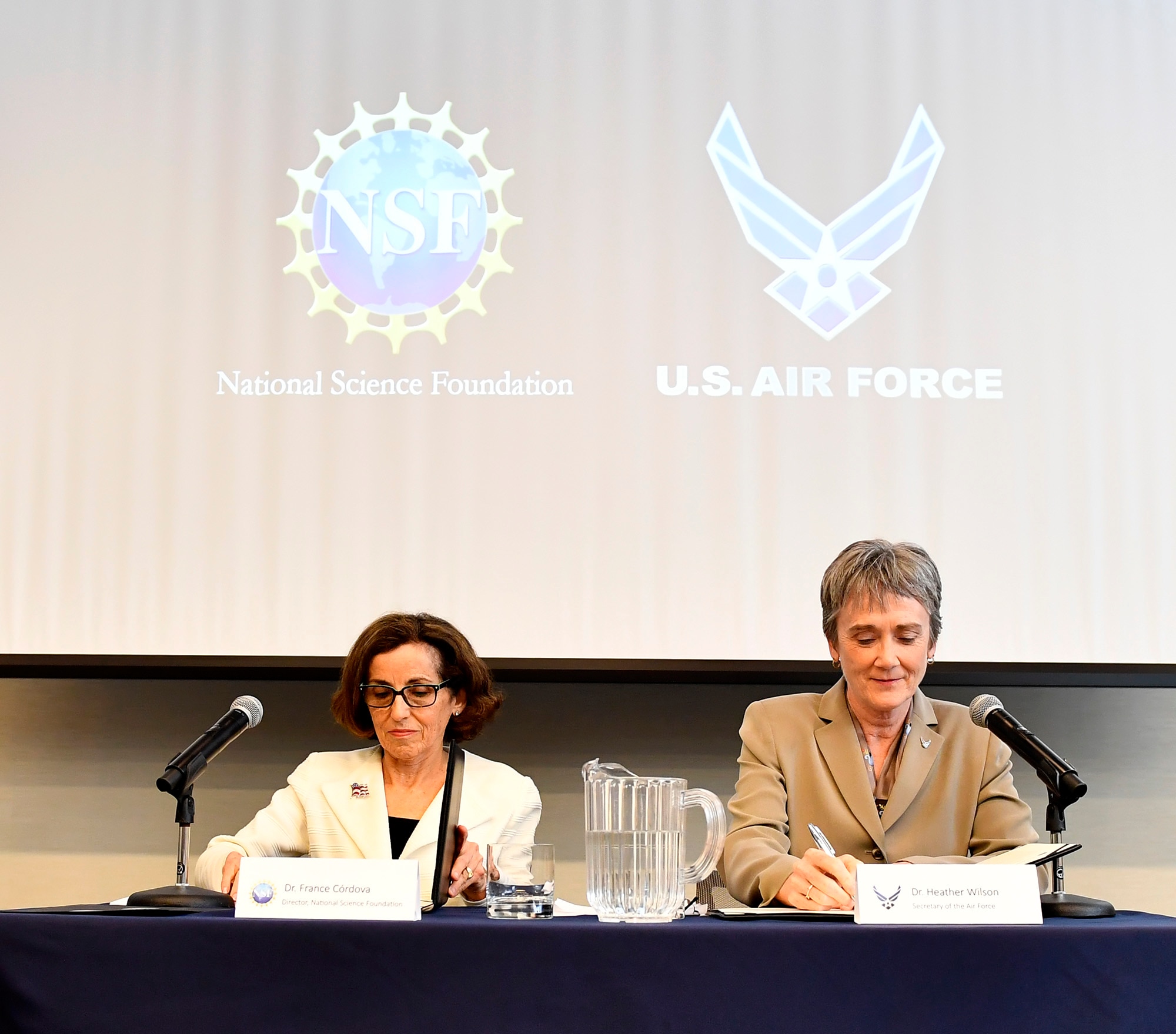 Secretary of the Air Force Heather Wilson and the National Science Foundation Director France Córdova sign a letter of intent in Washington, D.C., May 9, 2018. The letter of intent initiates a strategic partnership focused on research in four areas of common interest: space operations and geosciences, advanced material sciences, information and data sciences, and workforce and processes. (U.S. Air Force photo by Staff Sgt. Rusty Frank)