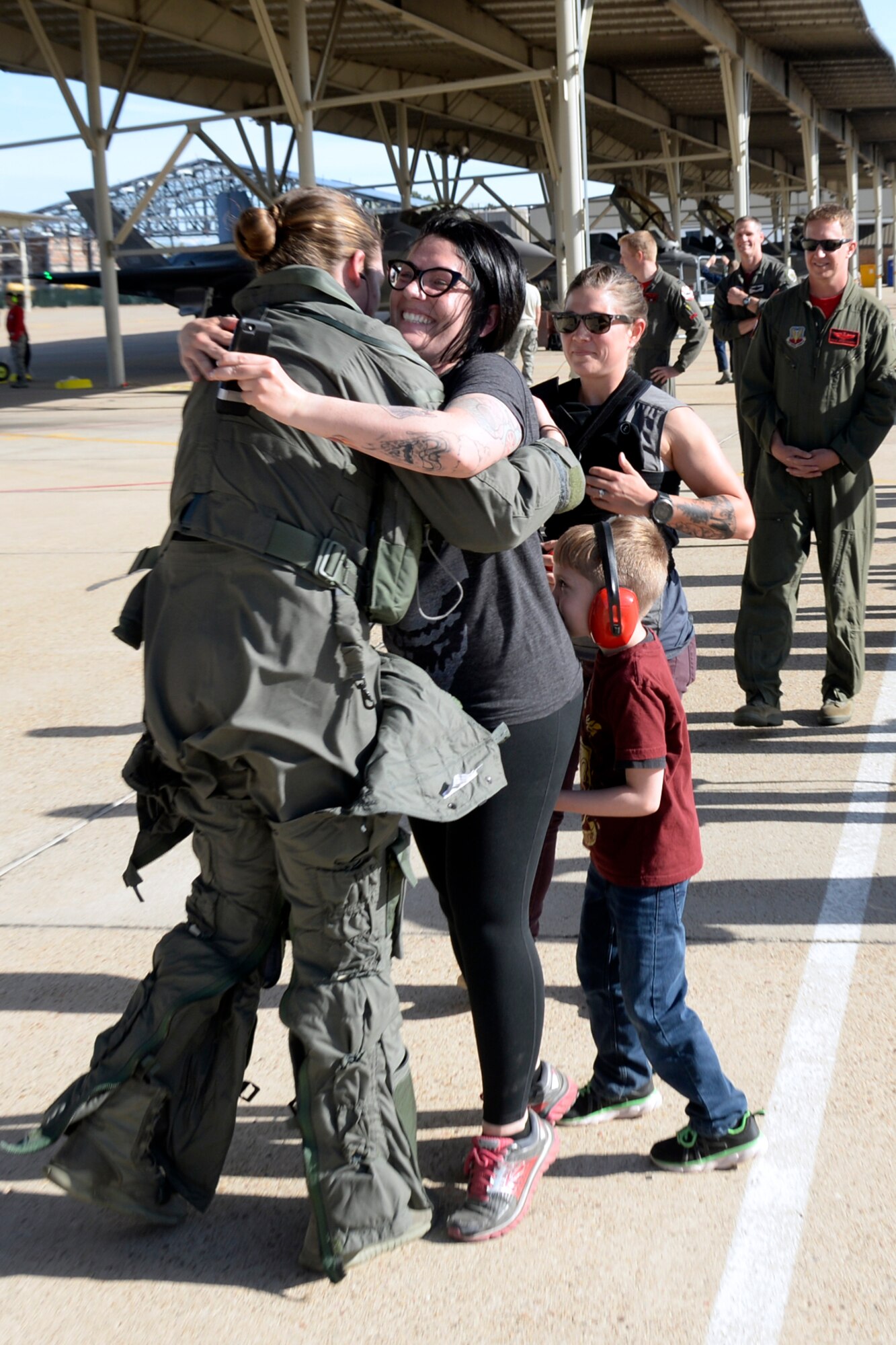 Capt. Kristin Wolfe, 34th Fighter Squadron, is welcomed home by family upon returning from deployment, May 5, 2018, at Hill Air Force Base, Utah. (U.S. Air Force photo by Todd Cromar)