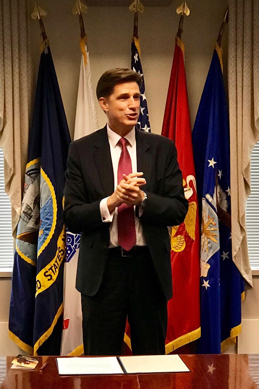 Dana Deasy addresses the gathering of his wife, staff and colleagues at the Pentagon’s Nunn-Lugar conference room following his swearing-in ceremony as the Defense Department’s chief information officer.