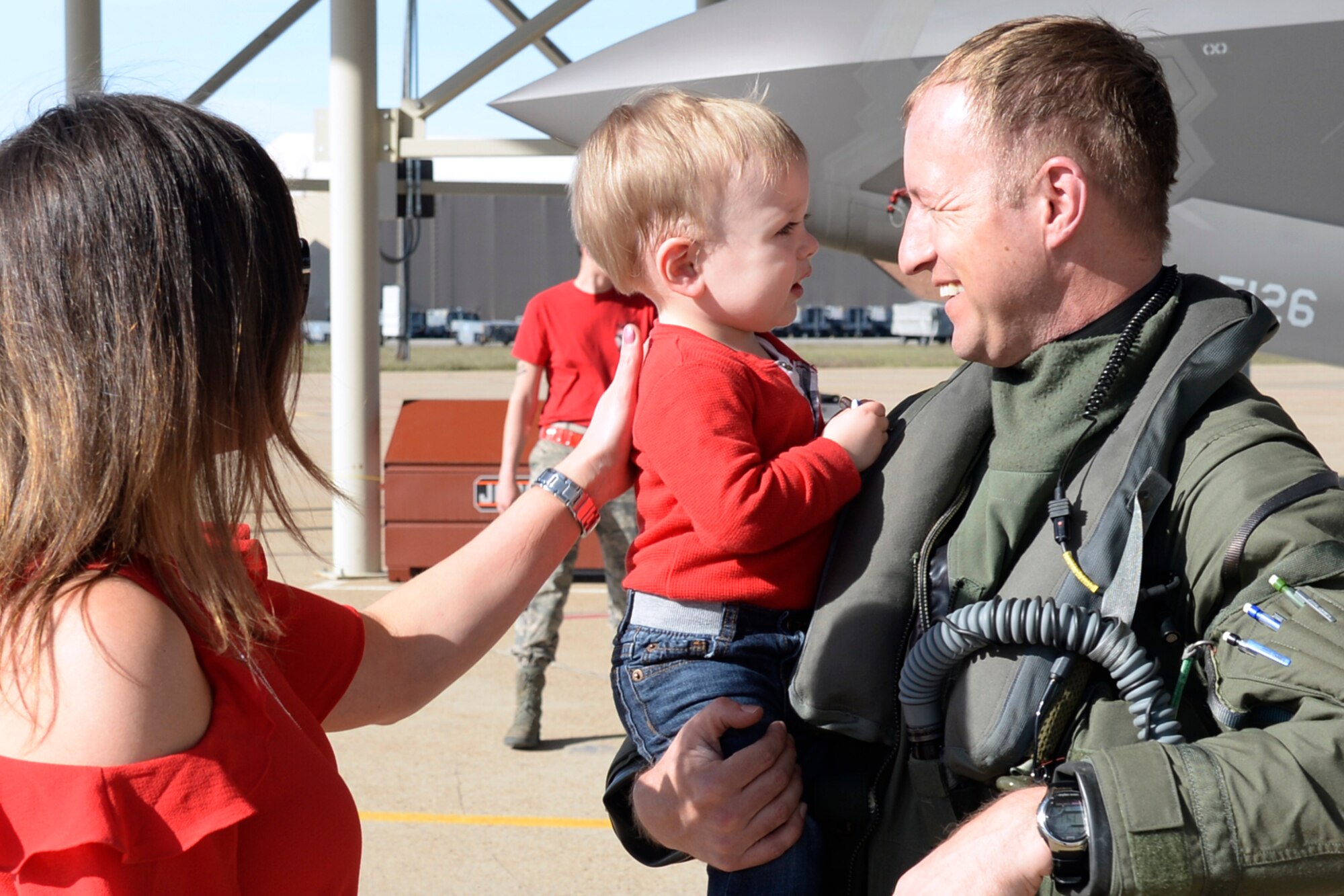 Lt. Col. Matthew Olsen, 388th Fighter Wing, is greeted by his wife and son, Allison and Bryce, upon returning from deployment, May 5, 2018, at Hill Air Force Base, Utah. (U.S. Air Force photo by Todd Cromar)