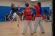Students demonstrate the Korean martial art Taekwondo as part of the National Asian American and Pacific Islander Heritage Celebration at Yokota High School, Yokota Air Base, Japan, May 3, 2018.