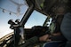 Capt. Cari Piha, and Maj. Toni Merhar, 535th Airlift Squadron C-17 Globemaster III pilots, watch a KC-135 Stratotanker during an in-flight refueling mission, Joint Base Pearl Harbor-Hickam, Hawaii, April 25, 2018. The aircrew featured mothers to celebrate mothers who serve in the military and to highlight challenges Airmen face when balancing families and career. (U.S. Air Force photo by Tech. Sgt. Heather Redman)