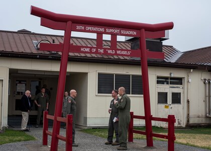 U.S. Air Force Col. R. Scott Jobe, left, the 35th Fighter Wing commander, speaks with USAF Brig. Gen. Jeffrey C. Bozard, right, the 5th Air Force vice commander, during a base tour at the 35th Operations Support Squadron at Misawa Air Base, Japan, May 2, 2018. Bozard visited a multitude of squadrons around base that gave service members a chance to display their enthusiasm for their jobs and work ethic. (U.S. Air Force photo by Airman 1st Class Collette Brooks)