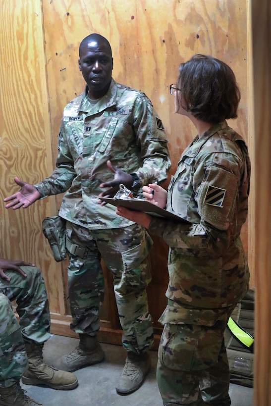 An Army physician assistant diagnoses a patient’s medical issue.